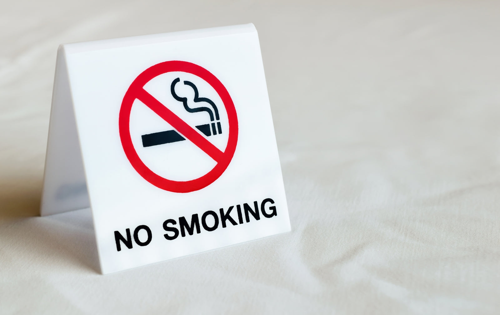 no smoking sign on table