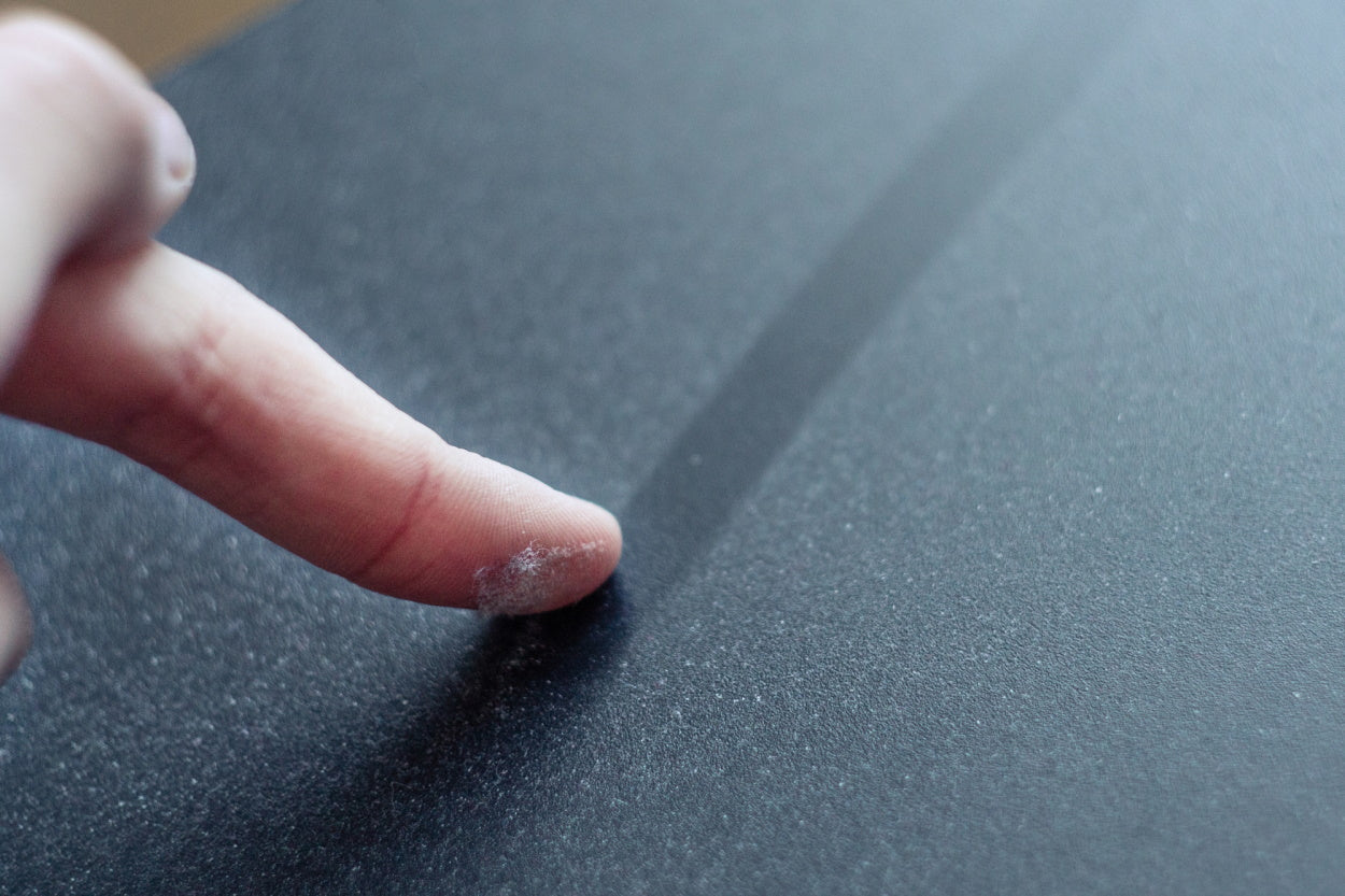 Finger wiping dust