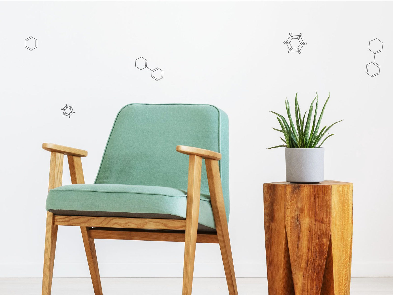 Modern armchair with side table and plant