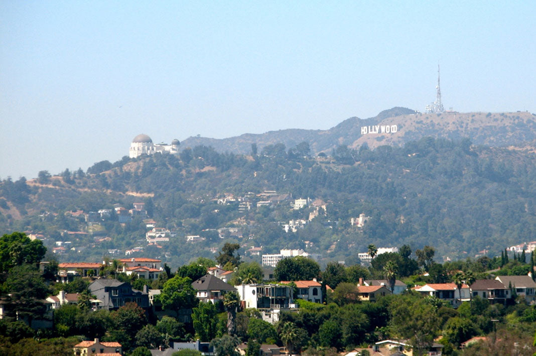 Hollywood sign overlooking houses on the hill