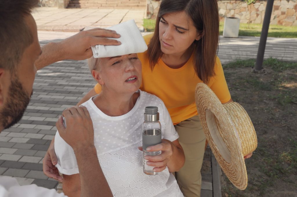 A woman receiving first aid for heat stroke