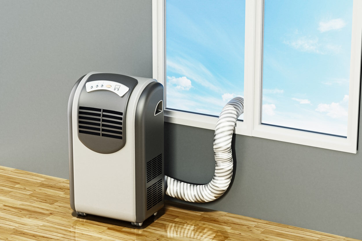 Single hose air conditioner next to window
