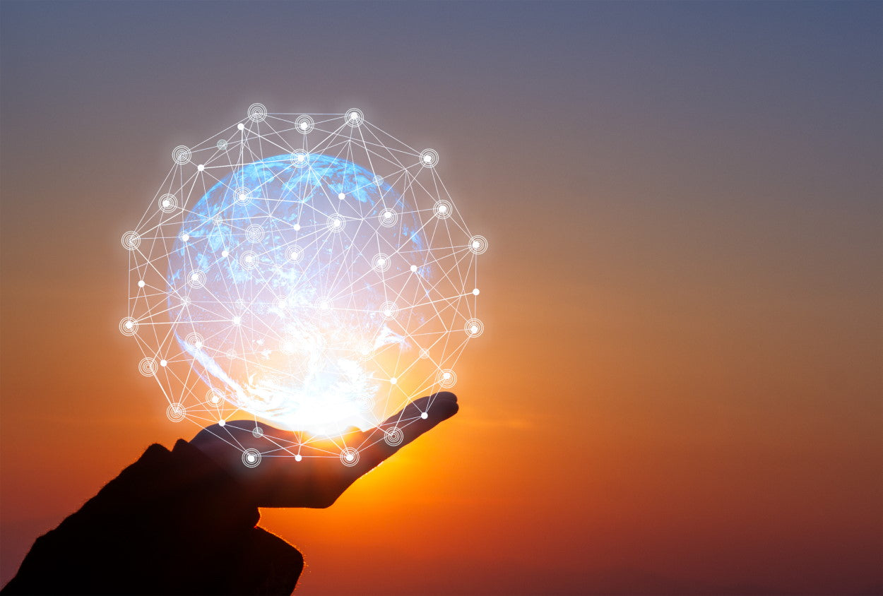 A hand holding an augmented reality earth