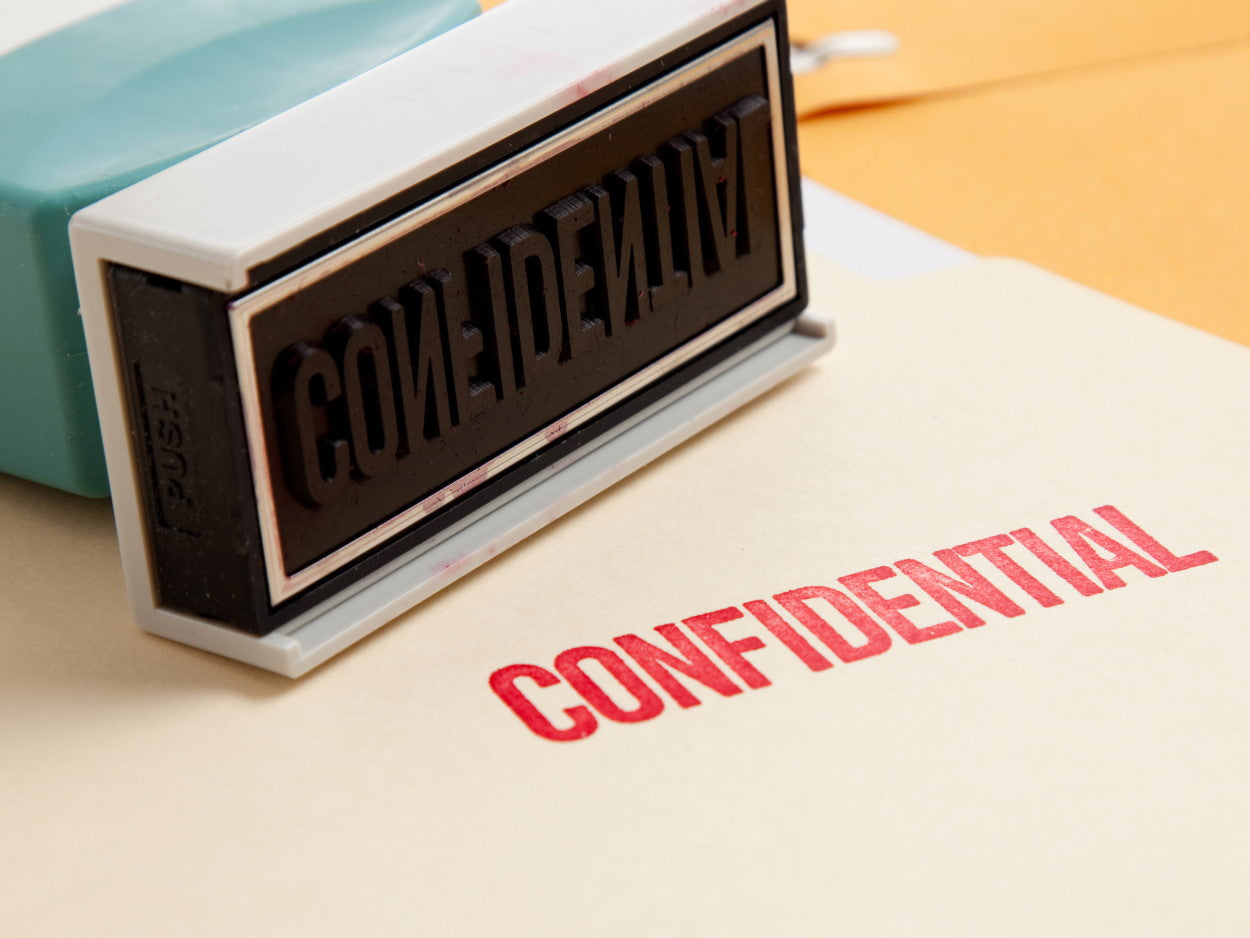 Confidential stamped in red ink